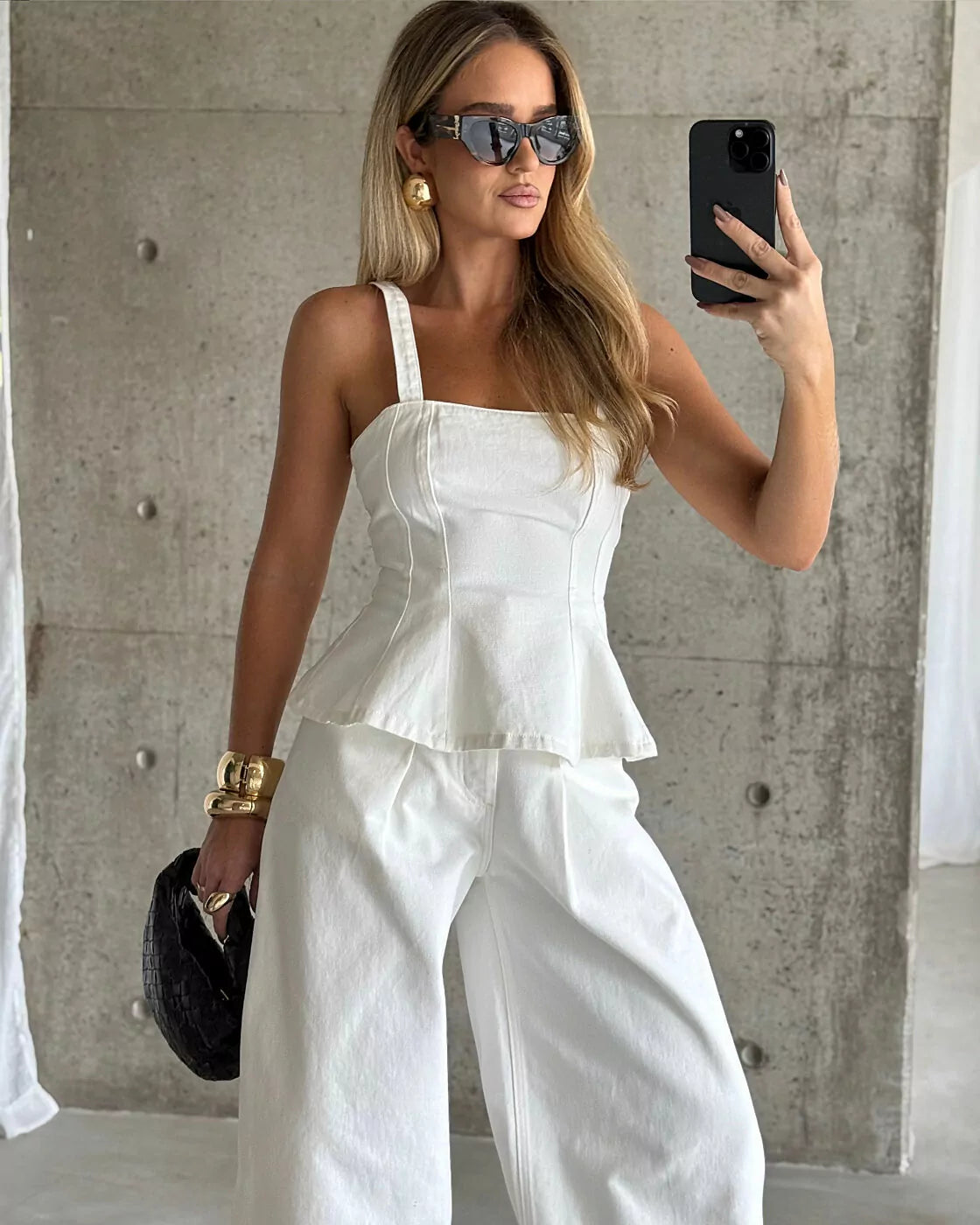 Top Peplum Recortes Brise em Jeans